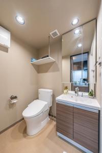 Ένα μπάνιο στο Apartment Hotel 11 Tsutenkaku