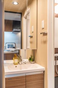 Ένα μπάνιο στο Apartment Hotel 11 Tsutenkaku