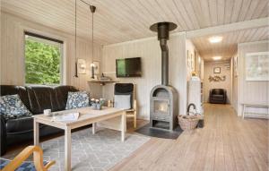 TV a/nebo společenská místnost v ubytování Holiday Home Fyrrelunden Ks Denmk