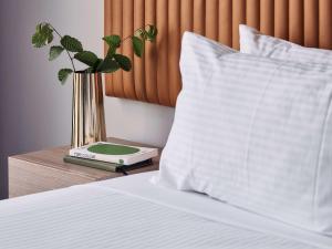 Postel nebo postele na pokoji v ubytování Mantra Melbourne Epping