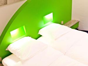Postel nebo postele na pokoji v ubytování Hotel Siru Brussels