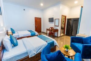 TV a/nebo společenská místnost v ubytování Rithy Rin Angkor Hotel
