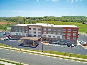 an aerial view of a large building with a parking lot at Holiday Inn Express & Suites - Abingdon by IHG in Abingdon