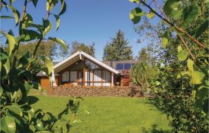 Сад в Four-Bedroom Holiday Home In Farso