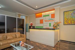 Χώρος καθιστικού στο Waringin Guest House Tegal Mitra RedDoorz