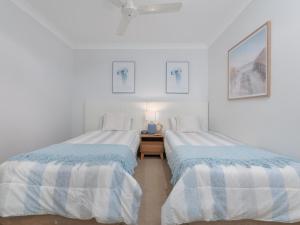 Postel nebo postele na pokoji v ubytování Koola Beach Apartments Bargara