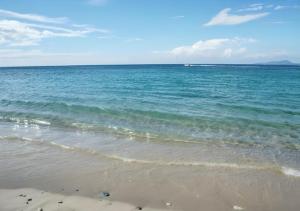 a view of the ocean from the beach at Oriental Hill Sabang Resort Puerto Galera in Puerto Galera +97 photos
