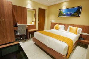Giường trong phòng chung tại Hotel Valley Vista +13 ảnh