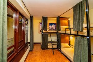 TV a/nebo společenská místnost v ubytování Kwabahal Garden Hostel