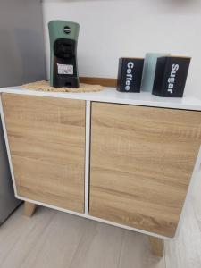 a white counter with two boxes on top of it at Casa Grazia in Domodossola