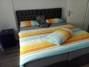 Postel nebo postele na pokoji v ubytování Apartments Metzingen Panoramablick