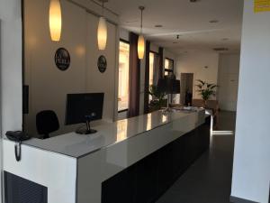 TV a/nebo společenská místnost v ubytování La Perla