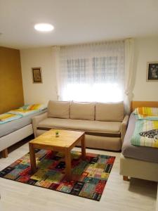 Posezení v ubytování Apartments Metzingen Panoramablick