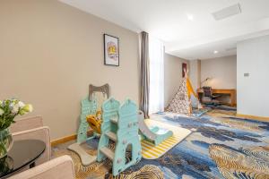 Postel nebo postele na pokoji v ubytování Zhangzhou Yuyuan Hotel