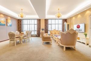 TV a/nebo společenská místnost v ubytování Zhangzhou Yuyuan Hotel