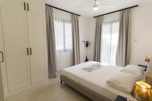 Katil atau katil-katil dalam bilik di Ilgaz Vineyard Suite by HolidayKeys +50 gambar