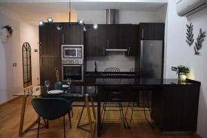 Η κουζίνα ή μικρή κουζίνα στο Living4Malaga Green Harmony Center