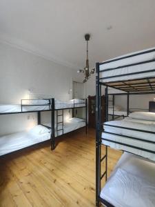 Voodi või voodid majutusasutuse Ambience Hostel & Apartments toas