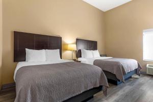 Postel nebo postele na pokoji v ubytování Quality Inn and Suites Groesbeck