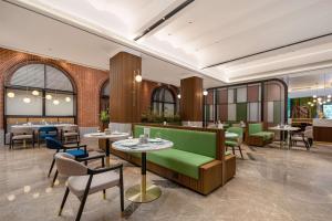 Coin salon dans l'établissement Hilton Garden Inn Shanghai Caoyang