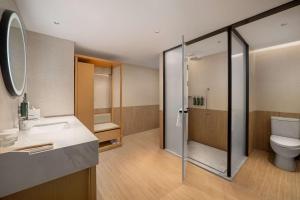 Salle de bains dans l'établissement Hilton Garden Inn Shanghai Caoyang