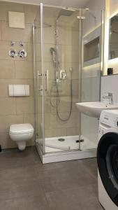 Koupelna v ubytování Apartment Metzingen City + 27 fotografií
