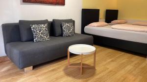 Postel nebo postele na pokoji v ubytování Apartment Metzingen City