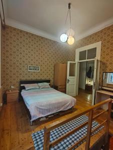 Voodi või voodid majutusasutuse Ambience Hostel & Apartments toas