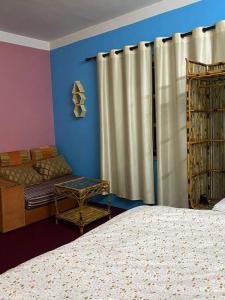 Postel nebo postele na pokoji v ubytování 3bhk perfect for a family