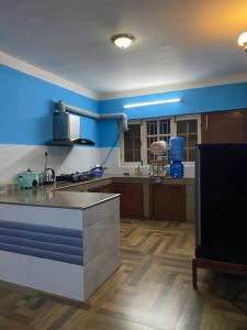 Kuchyň nebo kuchyňský kout v ubytování 3bhk perfect for a family