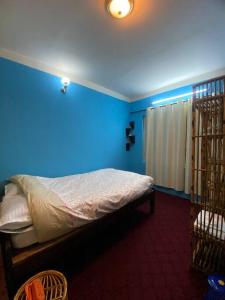 Postel nebo postele na pokoji v ubytování 3bhk perfect for a family