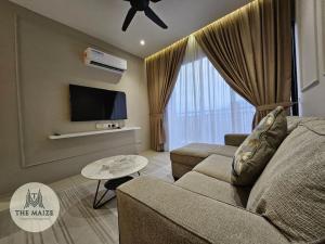 Μια τηλεόραση ή/και κέντρο ψυχαγωγίας στο The Cove Hillside Residence Ipoh - Downtown Delight