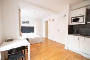 Η κουζίνα ή μικρή κουζίνα στο Charming Apartments Frankfurt City