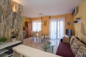 TV a/nebo společenská místnost v ubytování Apartments Marina