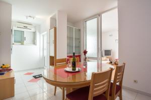 TV a/nebo společenská místnost v ubytování Apartments Marina