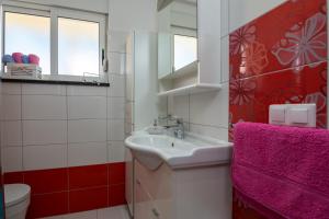 Koupelna v ubytování Apartments Marina + 37 fotografií