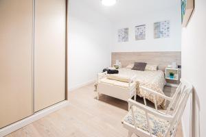 A bed or beds in a room at CARTAGENAFLATS, Apartamentos San Francisco
