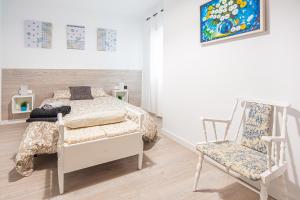 A bed or beds in a room at CARTAGENAFLATS, Apartamentos San Francisco