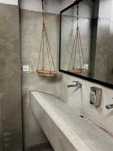 Baðherbergi á Hari Hari Hostel