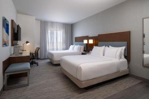 Ένα ή περισσότερα κρεβάτια σε δωμάτιο στο EVEN Hotel Bozeman Yellowstone Intl Arpt by IHG