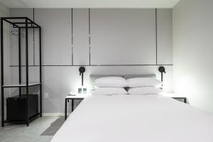 Seosan Hotel Posto客房内的一张或多张床位