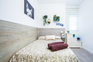 A bed or beds in a room at CARTAGENAFLATS, Apartamentos San Francisco