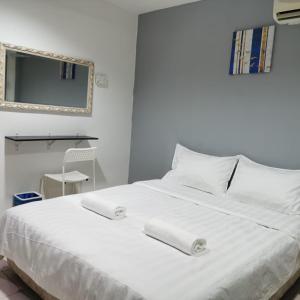 Postel nebo postele na pokoji v ubytování Hotel Seroja
