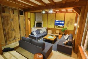 an overhead view of a living room with couches and a television at Villa Evasion in Louviers