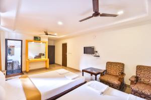 TV a/nebo společenská místnost v ubytování Hotel Golden Bliss