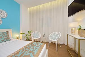 Posteľ alebo postele v izbe v ubytovaní Luxury Domus Apartment 2