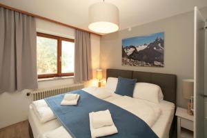 Posteľ alebo postele v izbe v ubytovaní Premium Chalet Andrea