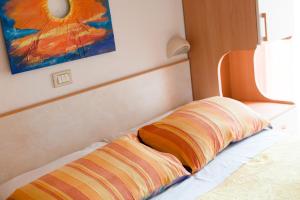 Postel nebo postele na pokoji v ubytování Hotel Atlantic