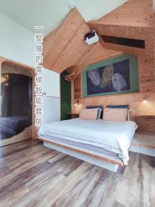 Postel nebo postele na pokoji v ubytování 棚棚屋室內帳篷民宿Inn