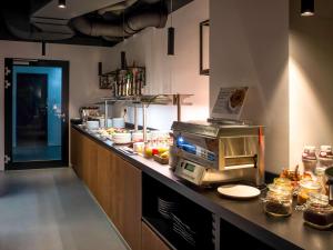 Eldhús eða eldhúskrókur á ibis Styles Wien Messe Prater